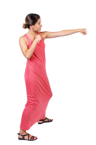 Skinny woman funny fights waving his arms and legs. — Stock Photo, Image