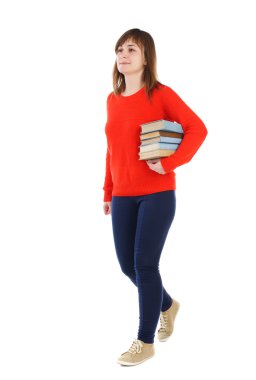 Kız kitap yığını ile gelir.