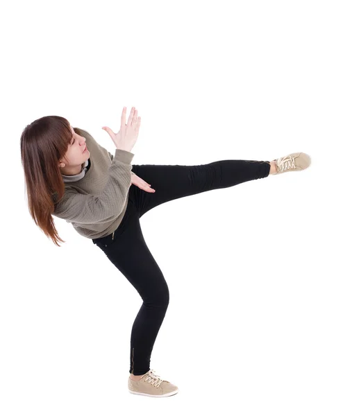 Back view of woman funny fights waving his arms and legs. — Stock Photo, Image