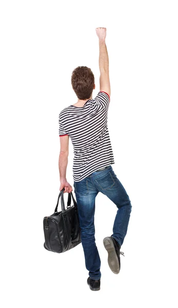 Pohled zezadu na člověka s taškou. — Stock fotografie