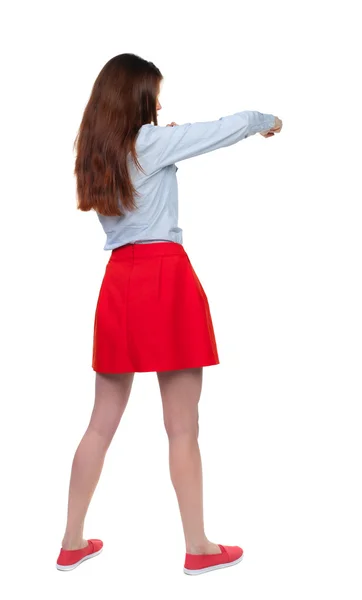 Αστεία κοκαλιάρικο γυναίκα παλεύει κουνώντας χέρια και πόδια. — Φωτογραφία Αρχείου