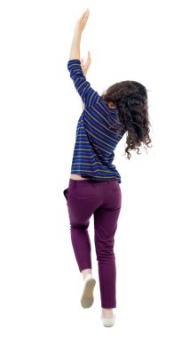 Arkadan görünüş genç güzel kadın dans. izlerken kız.