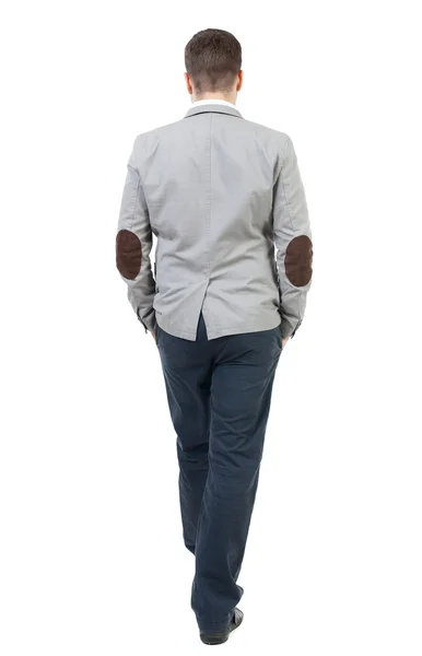 Back view of walking businessman. — Stock Photo, Image