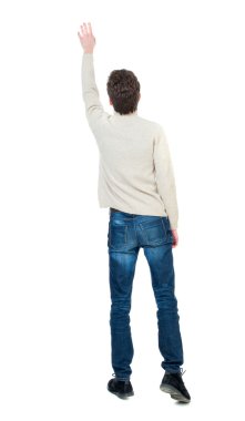 arkadan görünüşü adam. zafer işareti yumruğunu kaldırdı.