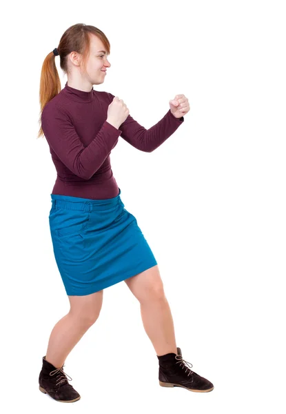 Donna scarna divertente combatte agitando le braccia e le gambe. — Foto Stock