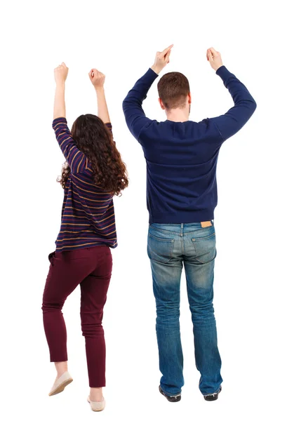 Back view of dancing young couple men and women . Dance party. — Stok fotoğraf