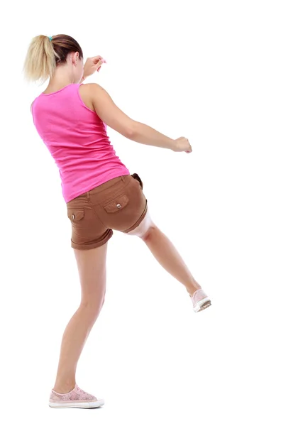 Vista posteriore di donna divertenti combattimenti agitando le braccia e le gambe. — Foto Stock
