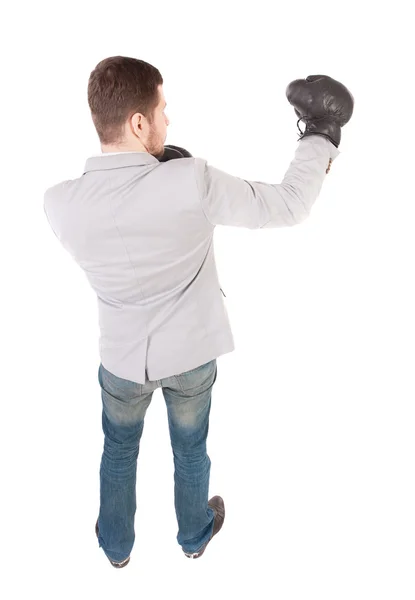 Businessman with boxing gloves in fighting stance. — Stock Photo, Image