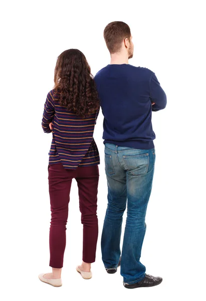 Back view of young embracing couple man and woman — Stockfoto