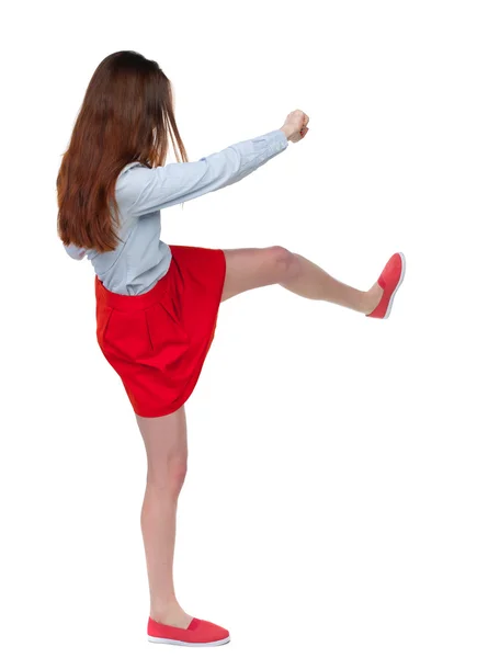 Mujer flacas gracioso combate agitando sus brazos y piernas. — Foto de Stock