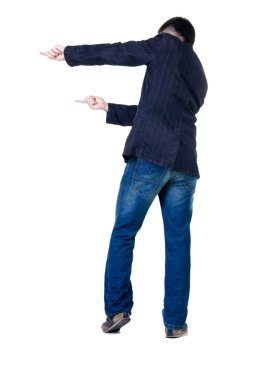 duvara dönük bir genç adam. arka görünüm.
