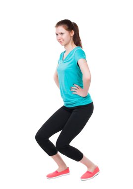 Arkadan ayakta genç güzel kadın spor elbise Inv görünüşü