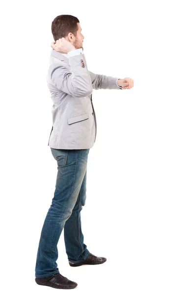 Back view of guy funny fights waving his arms and legs. — Stock Photo, Image