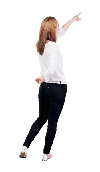 Vista posteriore della donna che punta . — Foto Stock