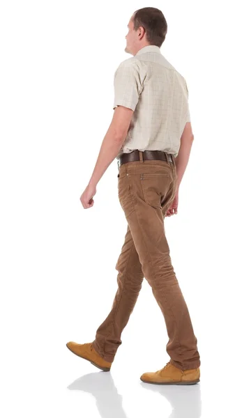 Arkadan görünüş-yakışıklı erkek kot pantolon ve gömlek gitme — Stok fotoğraf