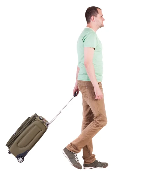 Vue arrière du marche homme avec valise. guy brunette dans motio — Photo