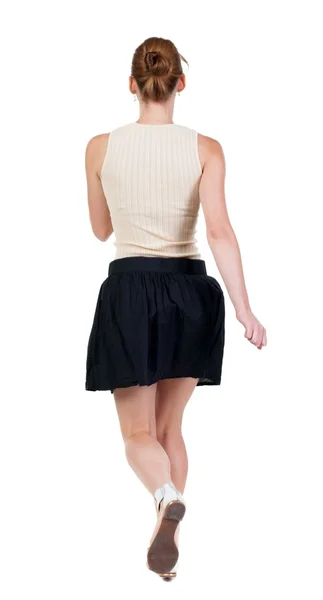 Rückansicht des laufenden Frau im Kleid — Stockfoto