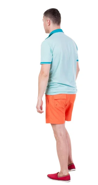 Back view of going  handsome man in shorts.  walking young guy — Stock Photo, Image