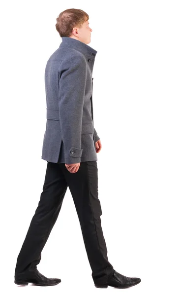 Vista di andare un uomo d'affari bel cappotto posteriore — Foto Stock