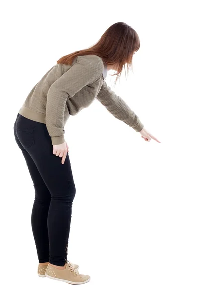 Visão traseira da mulher apontando . — Fotografia de Stock