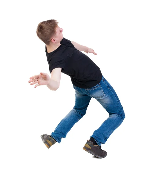 Balancing young man.  or dodge falling man — Stock Photo, Image