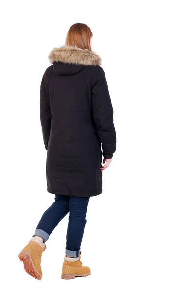 Vista posteriore di donna andante in parka. — Foto Stock