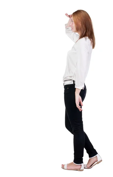 Vista de pé linda loira jovem jeans traseira. — Fotografia de Stock