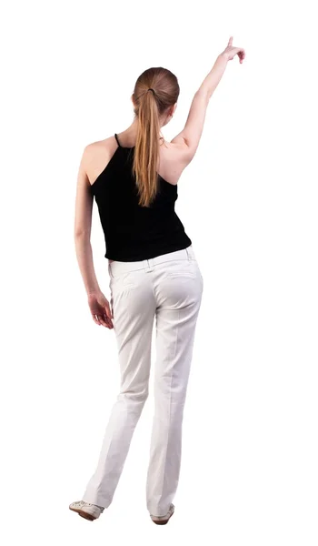 ポインティング女性の背面図 — ストック写真