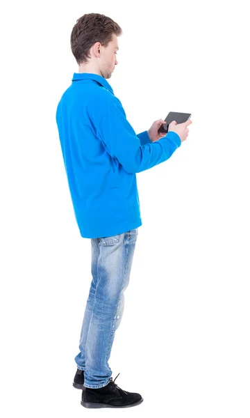 Back view of business man uses mobile phone. — Stock Photo, Image