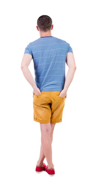 Rückansicht des gut aussehender Mann in kurzen Hosen — Stockfoto