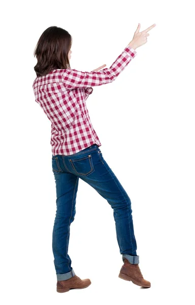 Back view of  pointing woman. — Stock Photo, Image