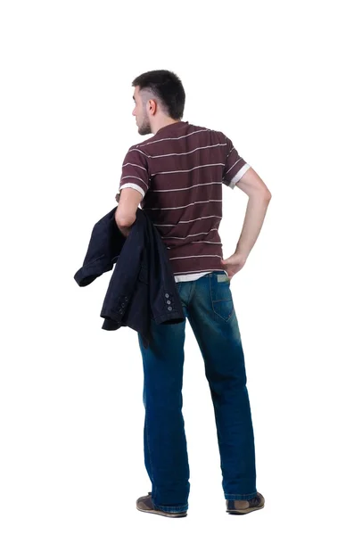 Young man looks ahead. rear view. Royalty Free Stock Photos