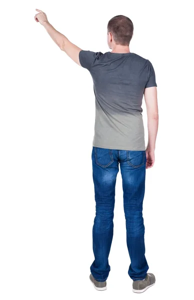 Pohled zezadu na polohovací mladých mužů v košili a džínách. — Stock fotografie
