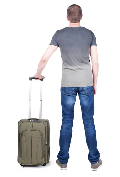 Back view of man with  green suitcase looking up. — Stock Photo, Image