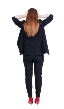 후면 충격된 비즈니스 여성 정장에서의 모습.
