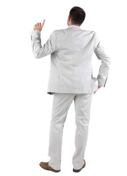 Vista posterior de hombre de negocios jóvenes pensando en traje blanco. —  Fotos de Stock