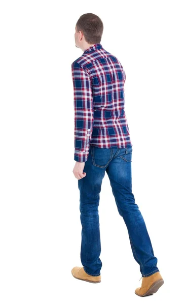 Back view of going  handsome man in checkered shirt. — Stock Photo, Image