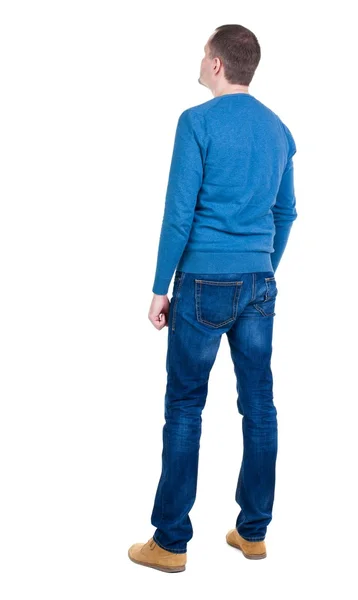 Pohled zezadu na pohledný muž v modrém svetru. — Stock fotografie