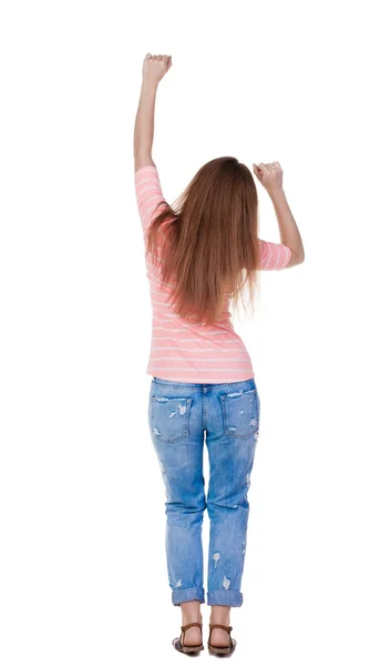 Back view of  joyful woman celebrating victory hands up. — Stock Photo, Image