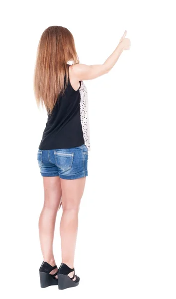 Back view of  pointing woman — Stock Photo, Image