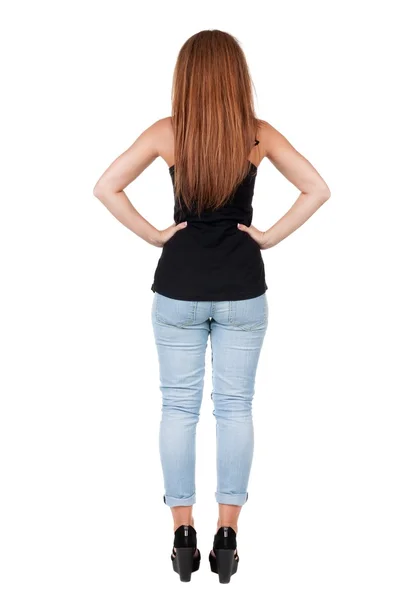 Vista posterior de mujer joven hermosa pelirroja de pie. — Foto de Stock