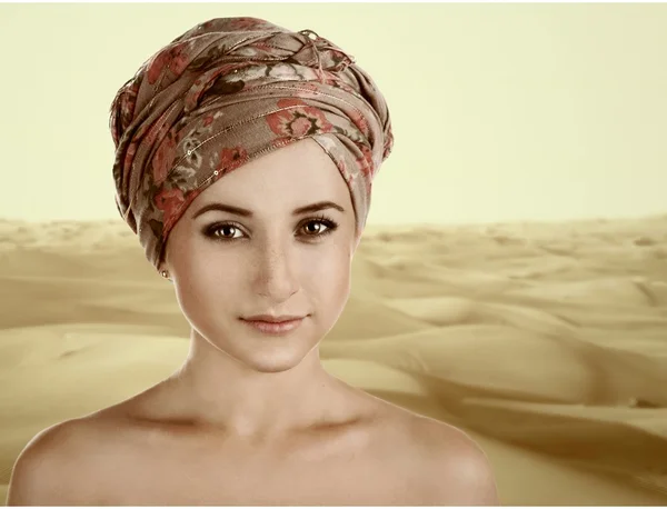 Portrait of white-skinned girl in a turban. caucasian woman with — Stock Photo, Image