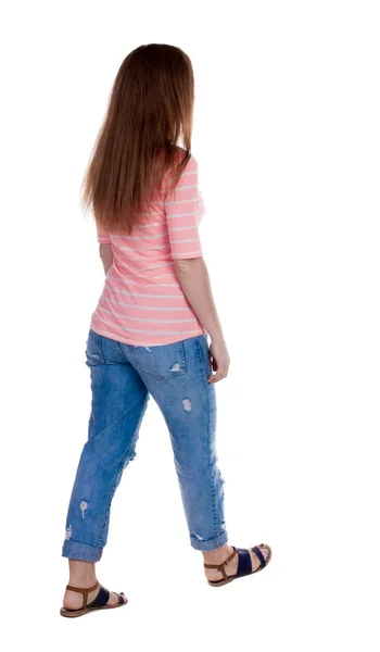 Pohled zezadu na chodící žena . — Stock fotografie