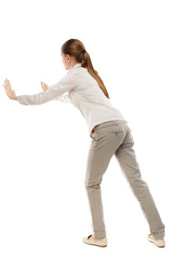 Kadın arkadan görünüm duvar iter.