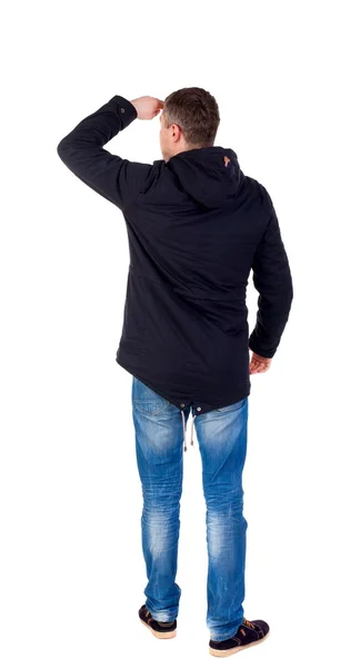 冬のジャケット探しているハンサムな男の背面図. — ストック写真