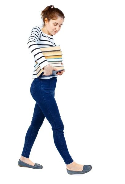 Chica viene con pila de libros. — Foto de Stock