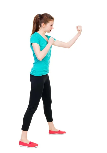 Skinny woman funny fights waving his arms and legs. Girl in spor — Photo