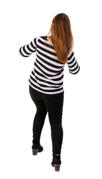 Back view of standing young beautiful  woman - Stock-foto