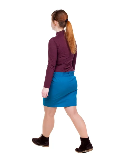 Back view of walking  woman. beautiful blonde girl in motion. — Stock Photo, Image