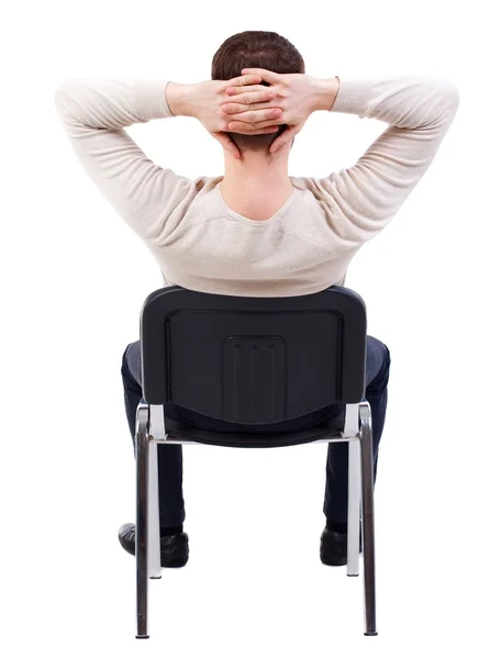 ビジネスの男性が椅子に座っての背面図. — ストック写真